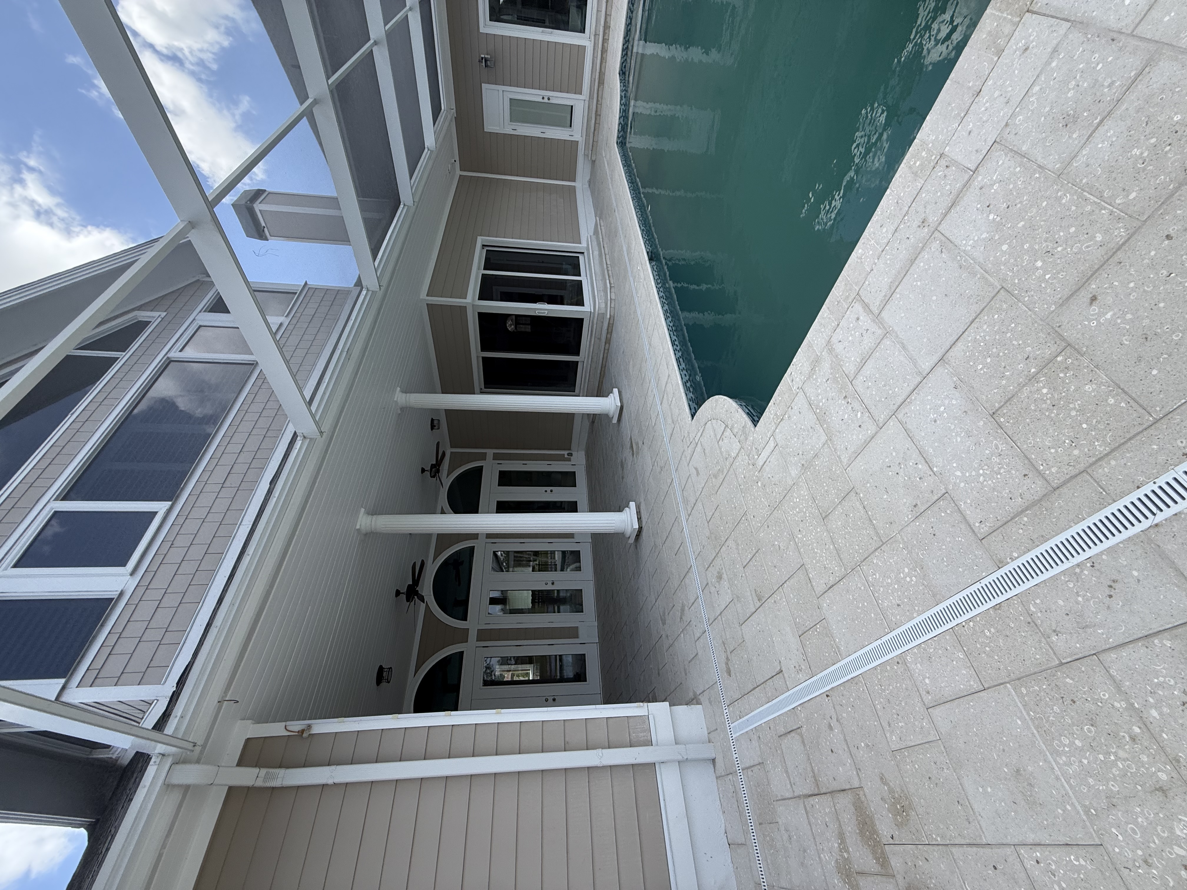 Professional paver installation around pool in Florida